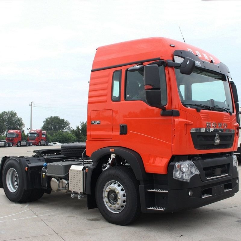 HOWO tractor truck with the genuine HOWO badge visible, from the company-supplied vehicle catalog.